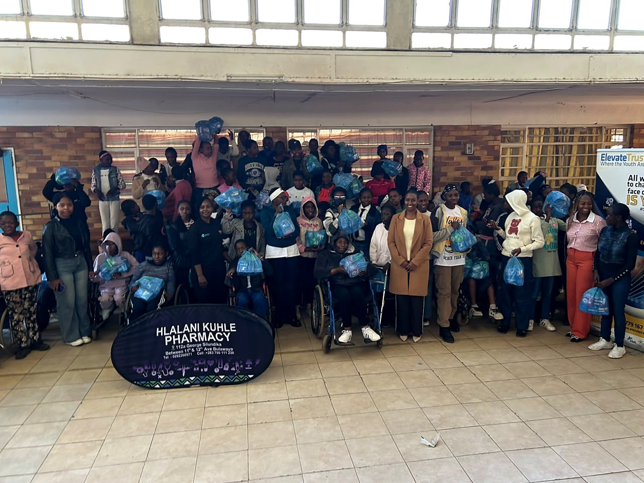 Rugare representatives and community members gathered after an outreach activity