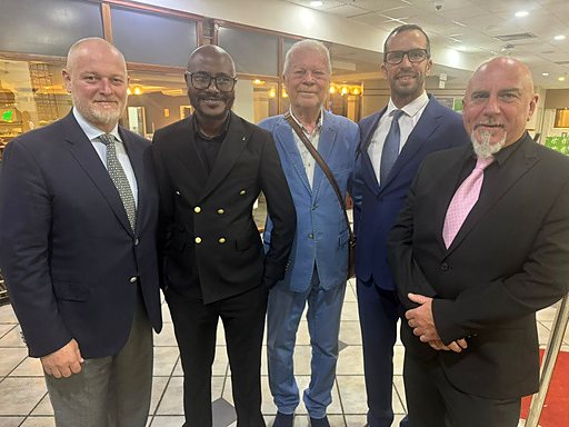 Five Rugare Medical board members and directors together at a formal event