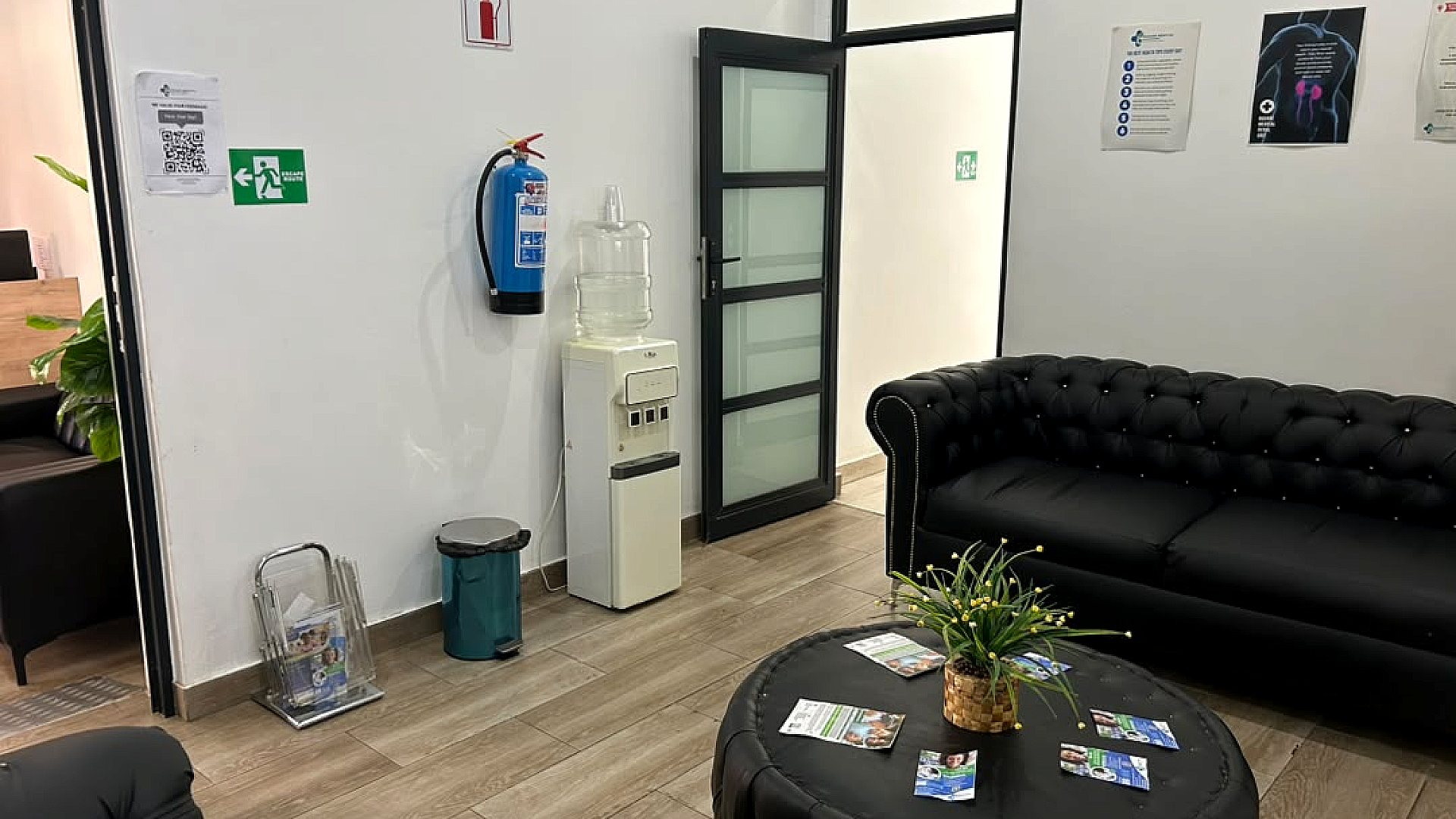A clean patient waiting area inside Rugare Medical